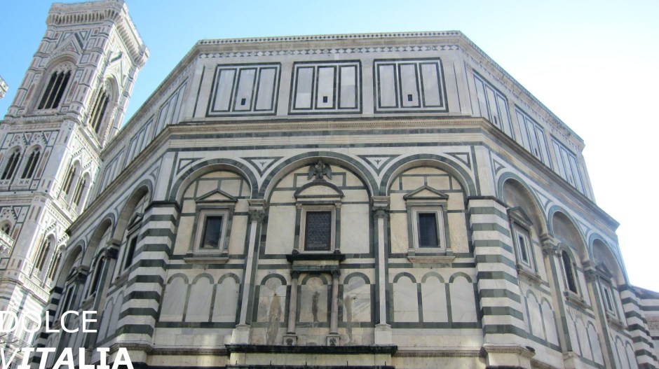 Baptistery located in Piazza del Duomo and Giotto's Bell Tower